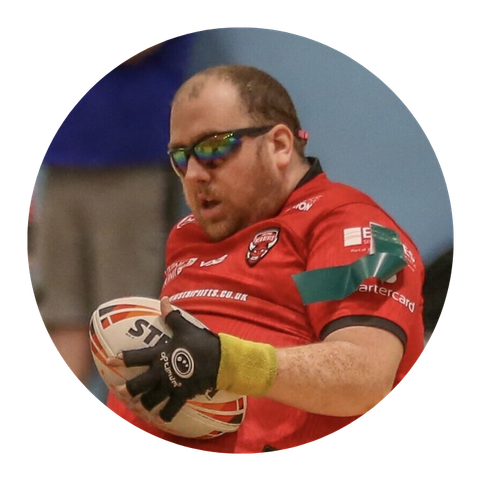 Oliver playing wheelchair rugby league 
