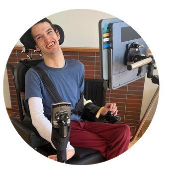 Noah Callan smiling with his Grid Pad 16