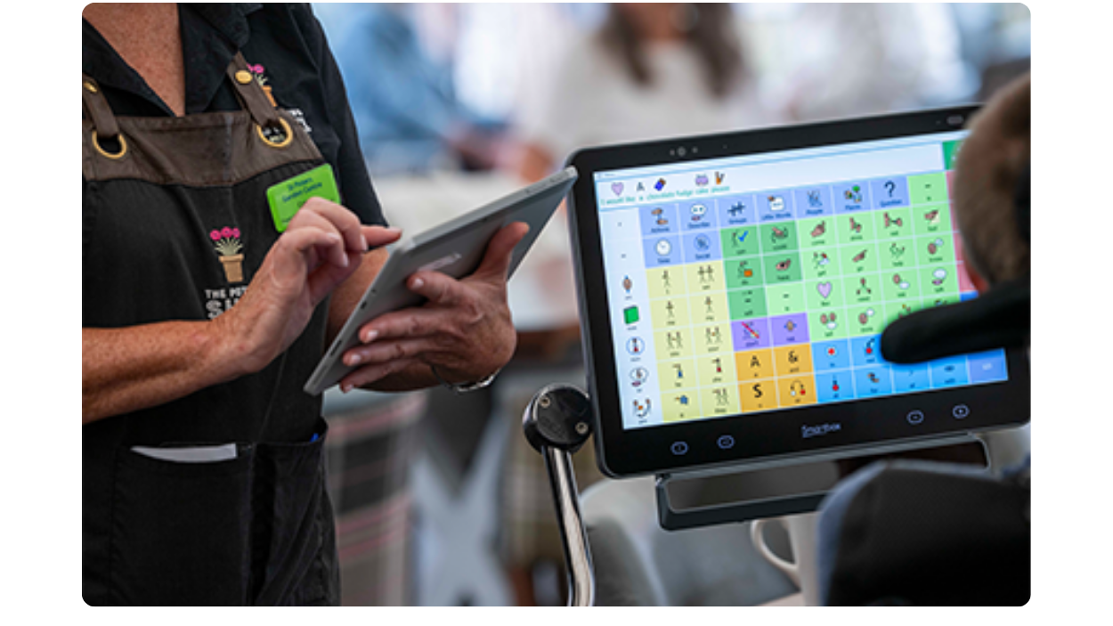 Samuel with his Evo at a cafe