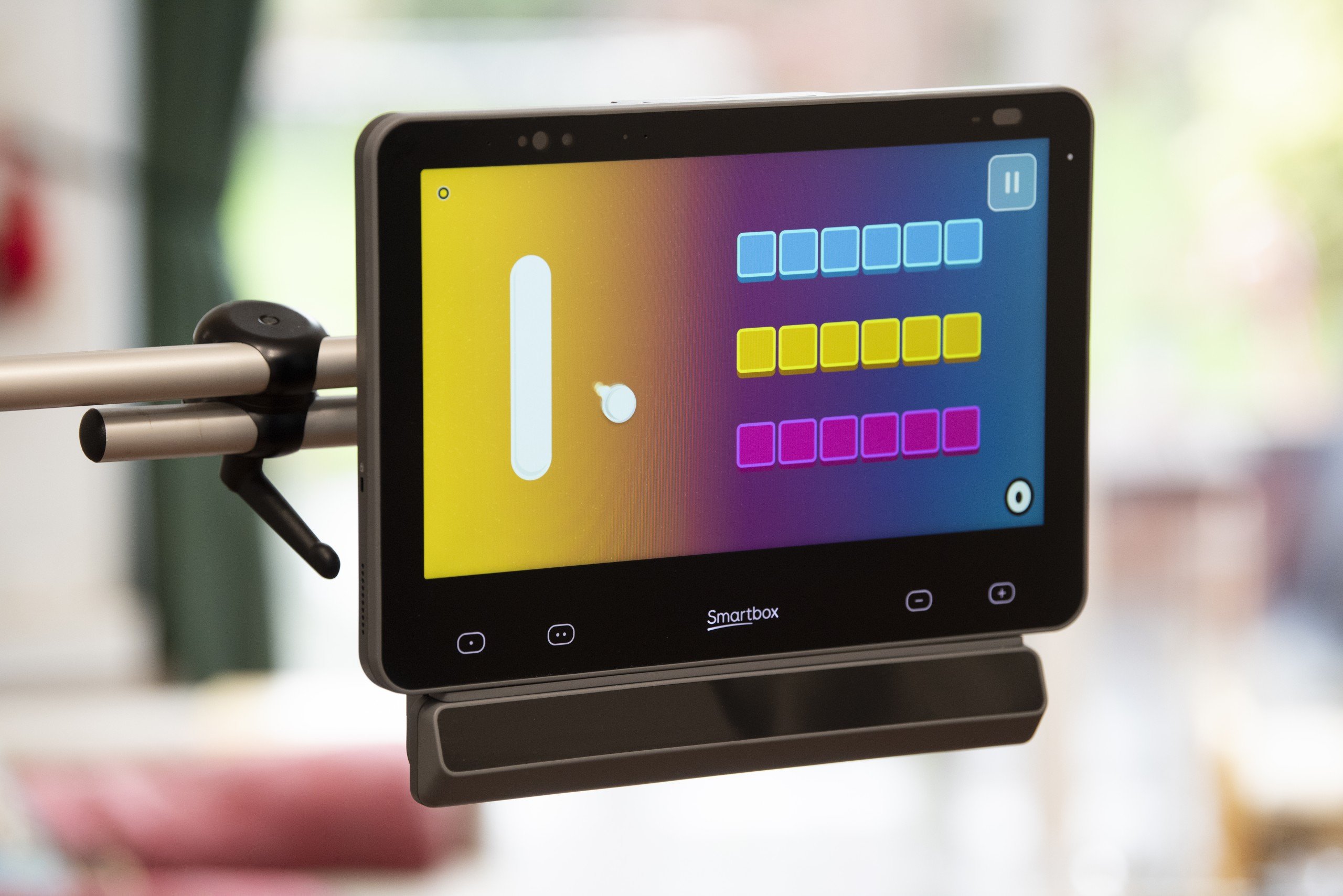 Build your eye gaze skills - Grid Pad with Evo and Look software on the screen.