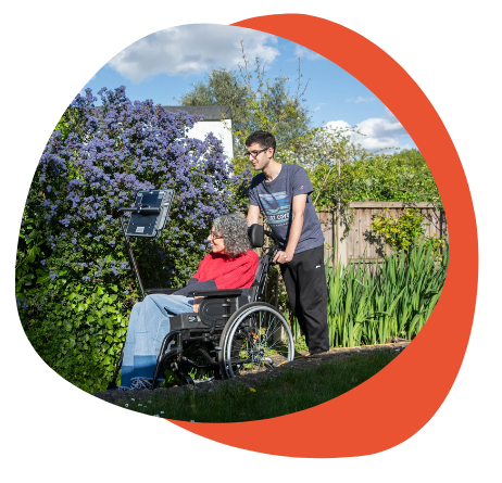 Sarah, Grid user living with MND, with her son. 
